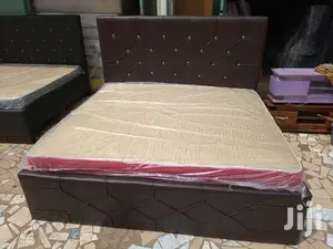 Brown Kings Bed With Matress .Free Delivery