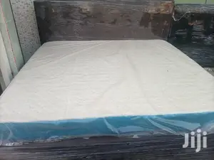 American King-size Bed With Mattress . Free Delivery