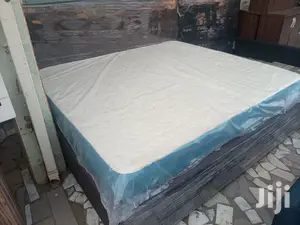 American King-size Bed With Mattress . Free Delivery