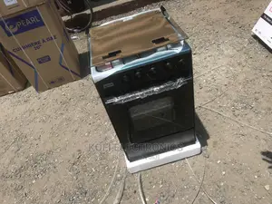 A Black Nasco Gas Cooker With Oven (50×50)