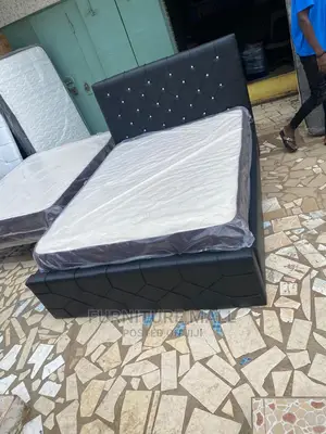 New Queensize Bed With Mattress . Free Delivery