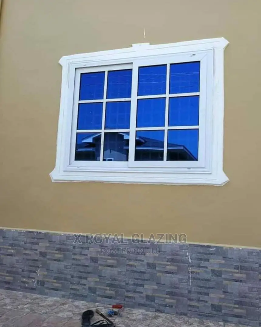 White Divisions With Blue Glass Sliding Windows