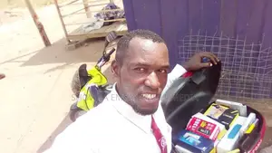 Delivery Guy Making Deliveries Within Accra Professionally