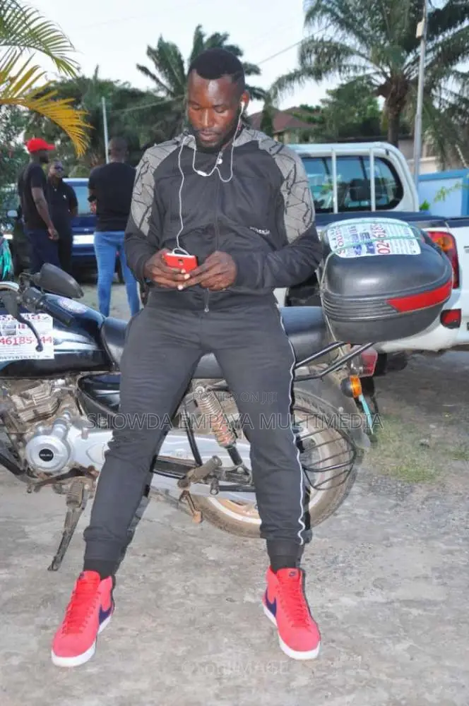 Delivery Guy Making Deliveries Within Accra Professionally