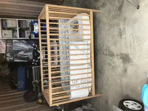 Adjustable Baby’S Wooden Cot From U.S.