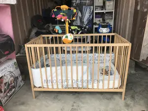 Adjustable Baby’S Wooden Cot From U.S.