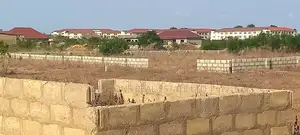 One Plot of Land Fenced at Millennium Cty Centre- Pentecost