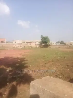 0.073, of an Acre Corner Plot on a Main Road at Kokomlemle.
