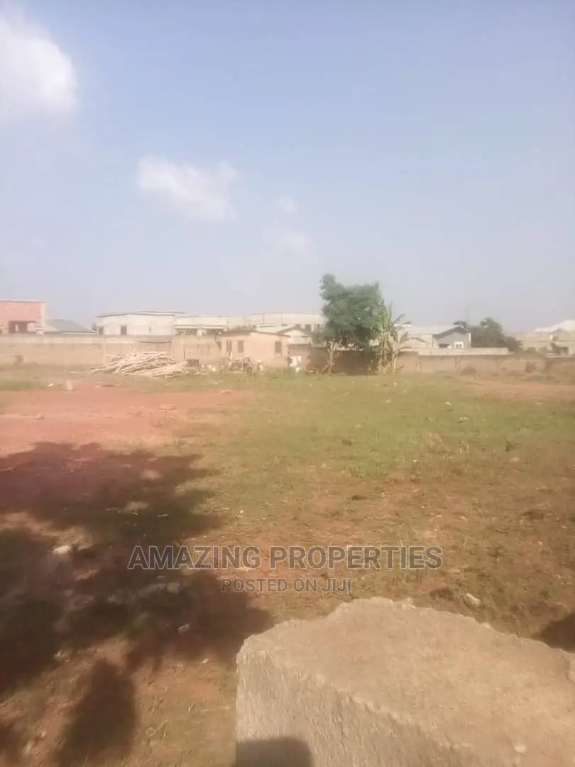 0.073, of an Acre Corner Plot on a Main Road at Kokomlemle.