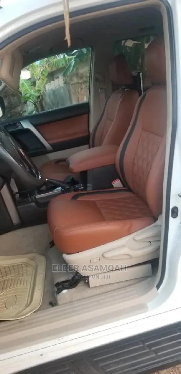 Elder Asamoah Car Seat Upholstery