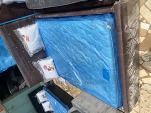 Brown Colored Bed With Mattress and Pillows Only. Fre Del