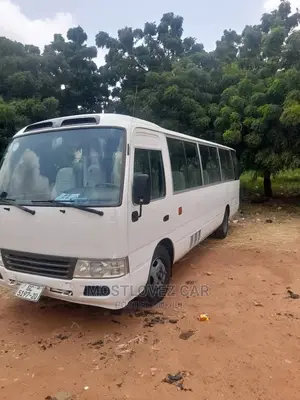 Toyota Coaster Buses for Rent in Ghana Tours Trips Funerals
