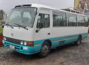 Toyota Coaster Buses for Rent in Ghana Tours Trips Funerals
