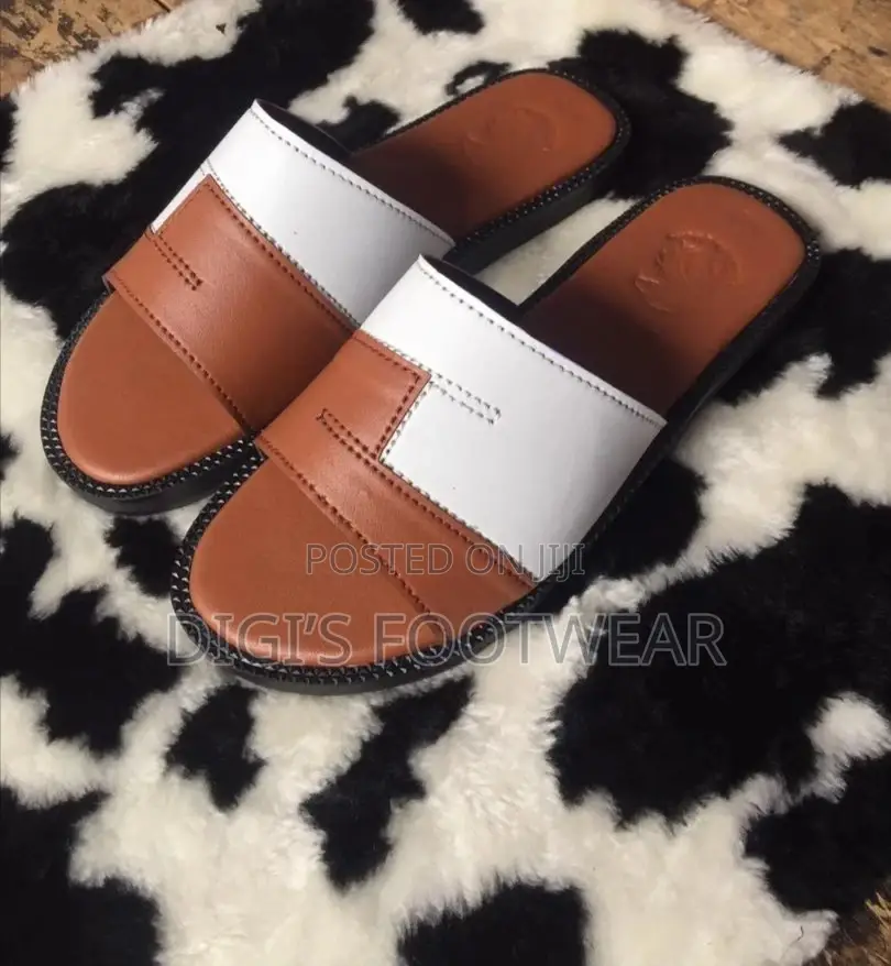 Brown and White Slippers
