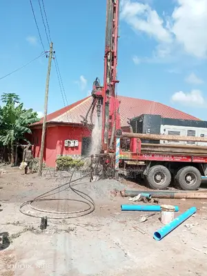 Borehole With Big Machine. Both Mechanised and Manual.