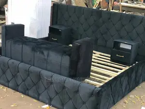 King Size Bed With Ottoman and Cabinets.