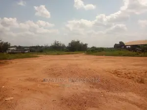 6 Acres *Titled Land at Ayikuma on the Dodowa Road.*