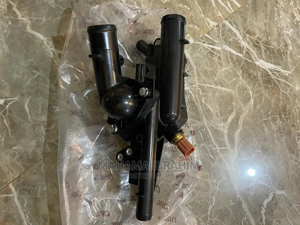 Thermostat Housing With Sensor
