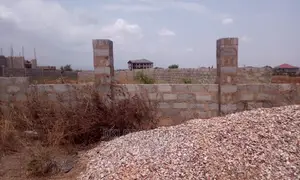 A Titled Plot of Land for Sale.