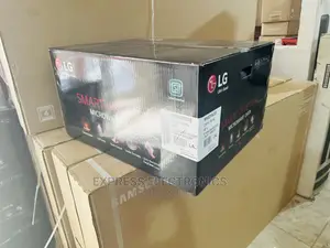 Adjustable Temperature LG Microwave Oven MH8265CIS