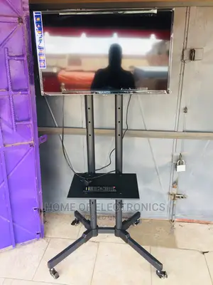 Affordable Movable/Trolley Mobile TV Stand With Wheels(32-70