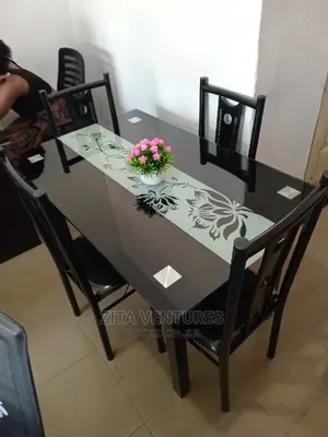 Dining Set With a Glass Top Table