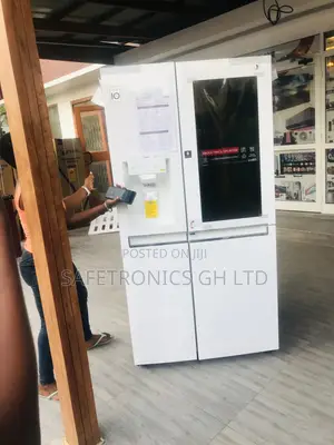 Side-by-Side LG Gross 874 Refrigerator New Door-in-Door