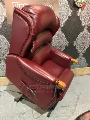 Immaculate Electric Rise Recline Chesterfield