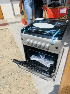 Authentic Volcano 50x55 4 Gas Burner(Gray)Oven and Grill.