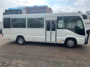RENT a CAR- Coasters Bus With Refrigerator Luxury Bus Rental