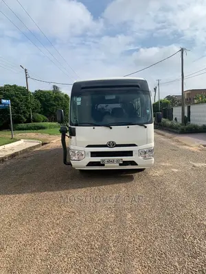 RENT a CAR- Coasters Bus With Refrigerator Luxury Bus Rental
