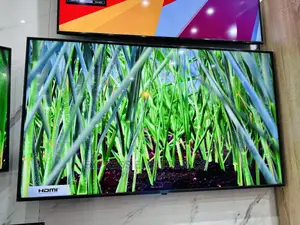 Glossy Black Slim Display Uhd Ua55”Au7000 Samsung Tv