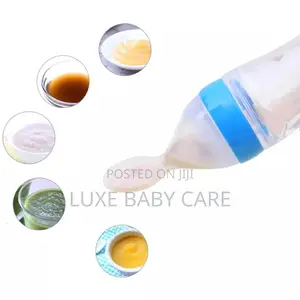 Baby Squeezing Feeding Bottle, Silicone Training Spoon