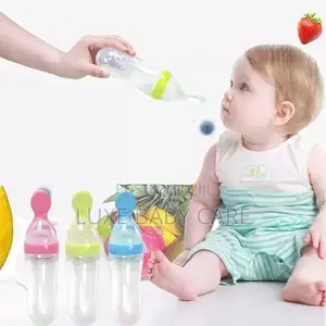 Baby Squeezing Feeding Bottle, Silicone Training Spoon
