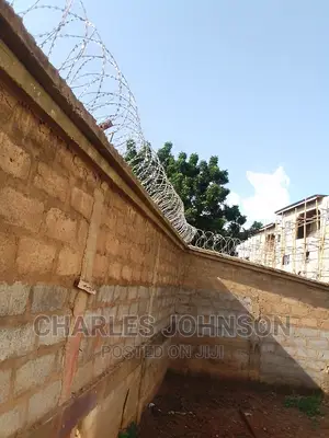 Razor Wire Installation and Security Camera.