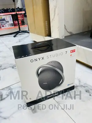 Fast Playing Harman Kardon Onyx Studio 7 Bluetooth Speaker.
