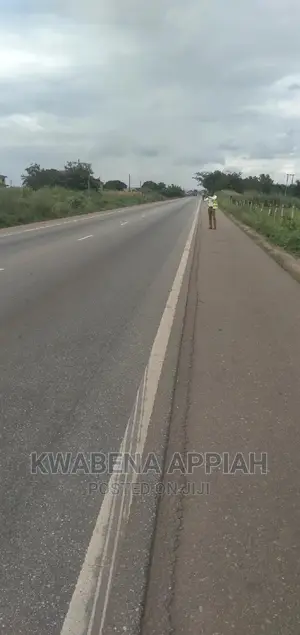 About Two and Half Echer Land at Accra Kumasi High Way