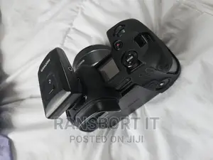 Canon Eos R Mirrorless Camera With Rf 50mm F1.8 Lens
