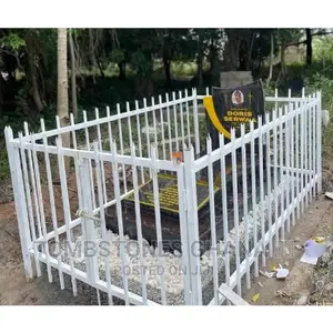 Tombstone With Metal Balustrade