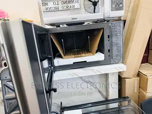 Very Adorable  New Sliver LG Microwave Oven Grill 42L