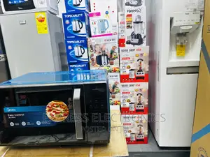 Look  Very Nice Microwave Oven Midea 32L Em9p032 Mx