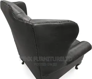Chesterfield High Back Leather Wing Chair With Footstall