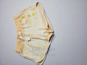 All in Motion Orange and White Water Color Soft Shorts