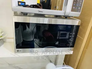 LG MG8265CIS Electric Microwave Oven(Silver).