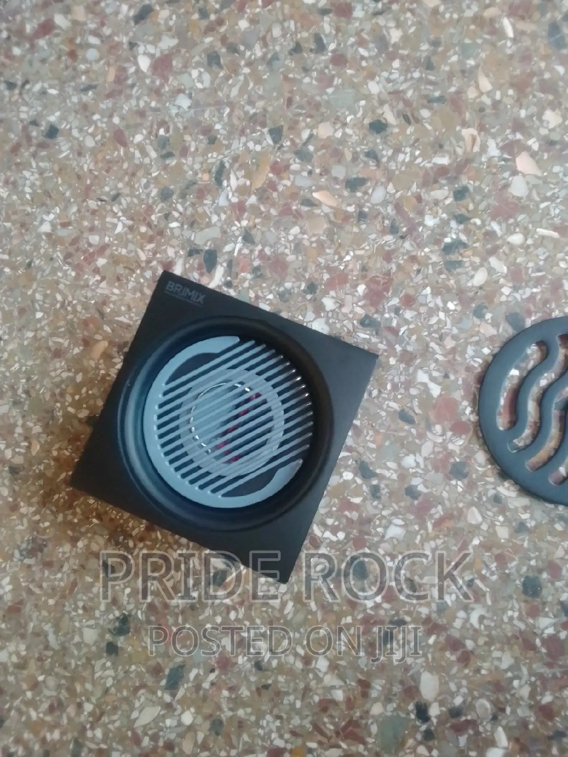 Black Metal Antitrust Floor Drain