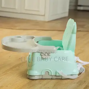 Booster Seat With Adjustable Food Tray