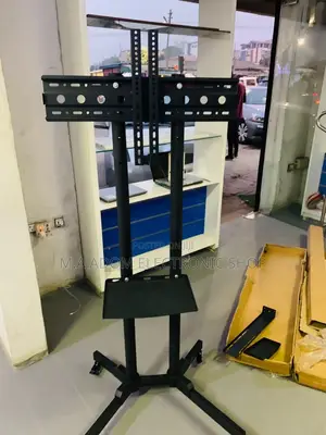 Purchase Adorable Moveable Tv Stand for 32”-65”.