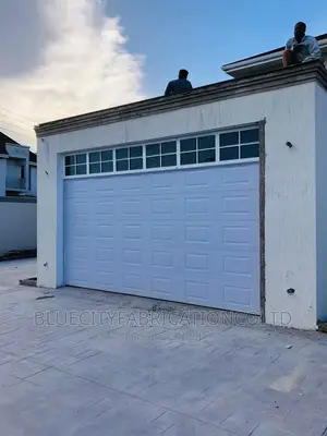 American Automated Garage Door and Fanlight on Top 16ft X8ft