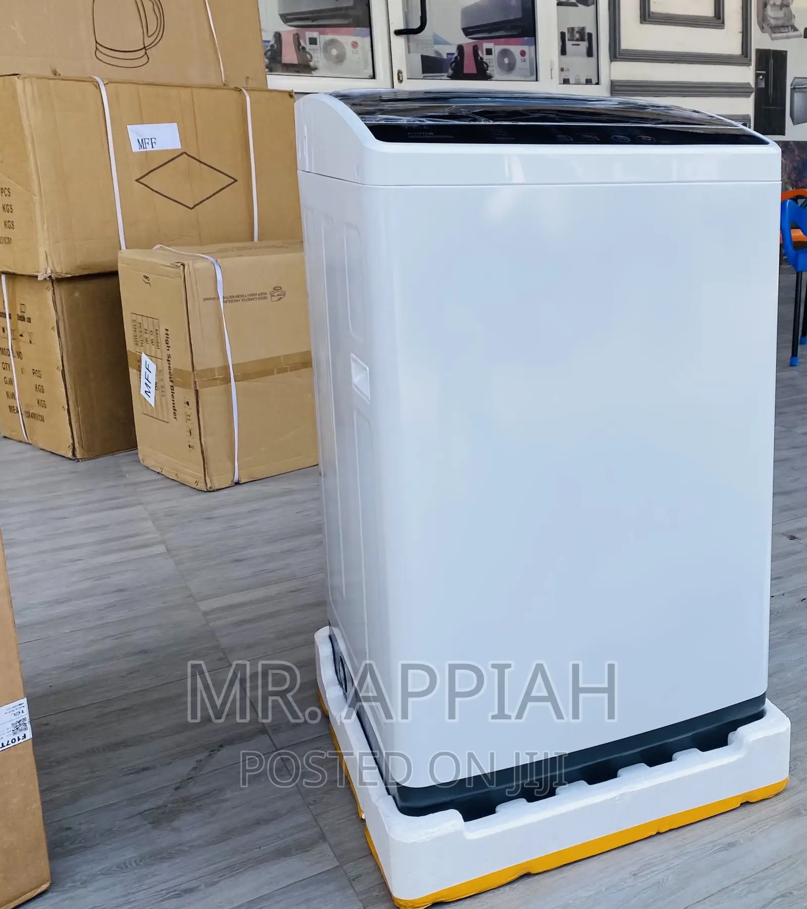 Adorable TCL 7kg Top Load Full Automatic Washing Machine.