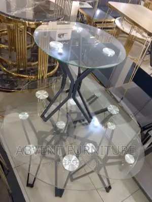 Glass Center Table and 4 Coffee Tables